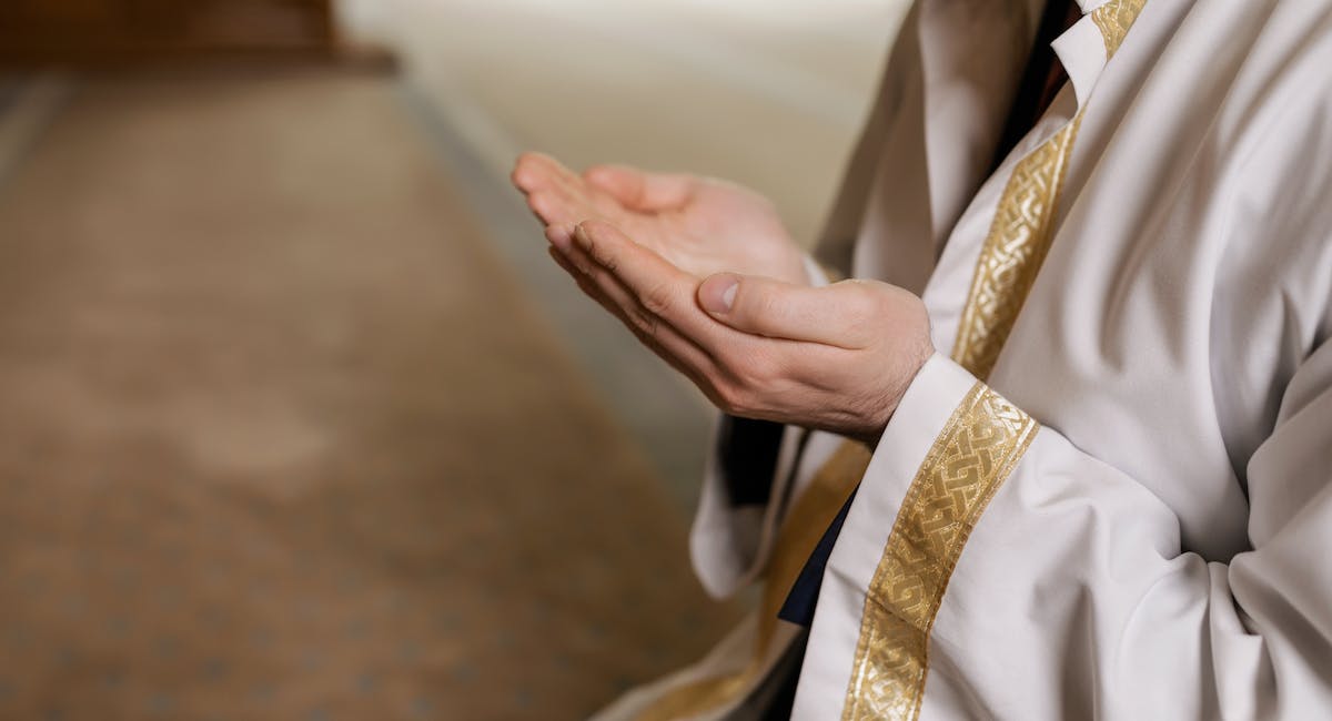 a muslim man praying 