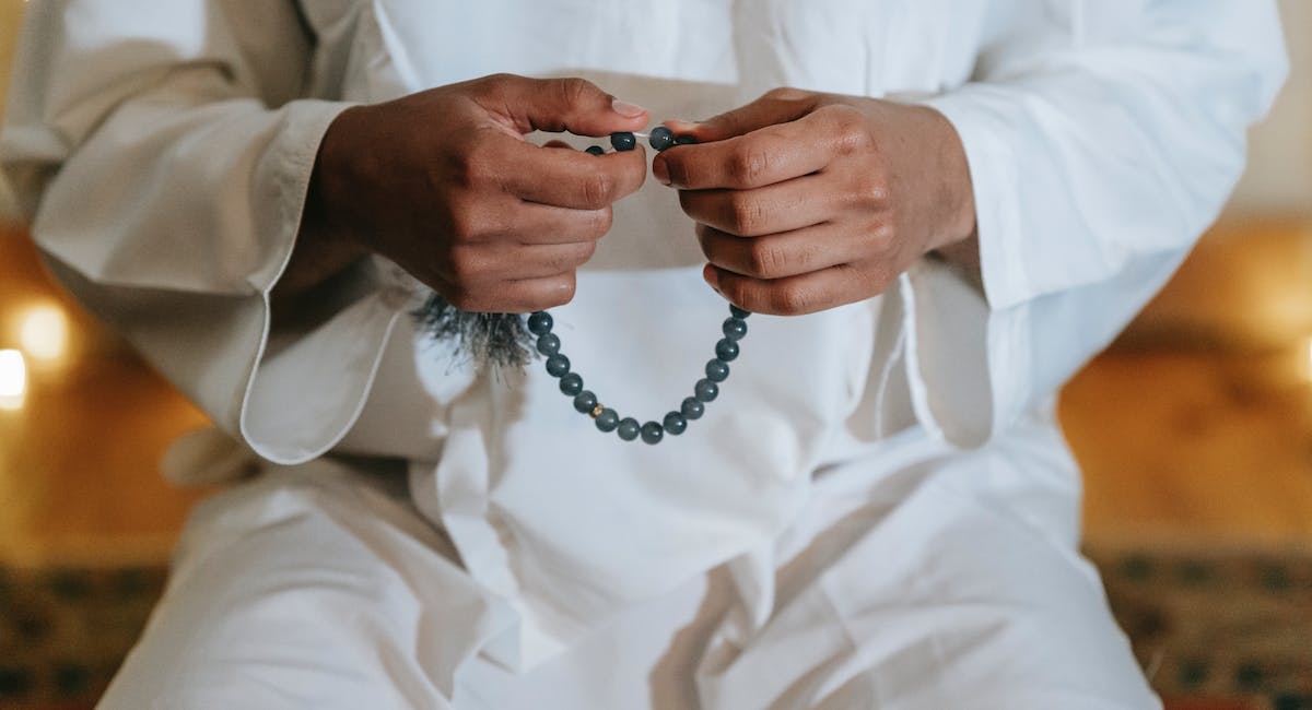 A muslim MAN PRAYING TO ALLAH