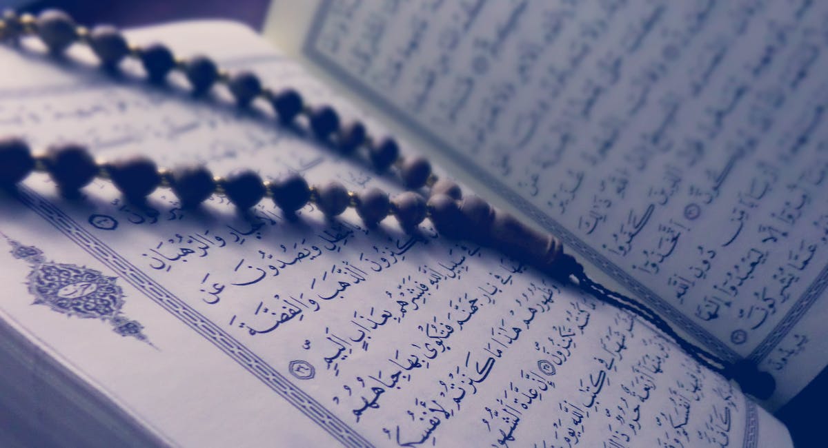 muslims holy book Quran with tassbih